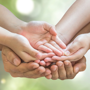 Group of people hands overlapping